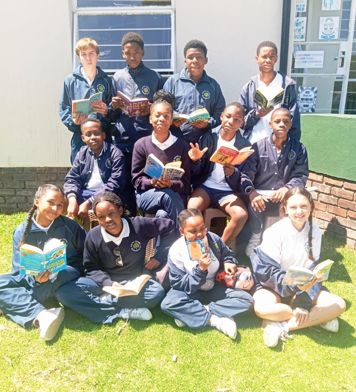 Oak Hill learners with books